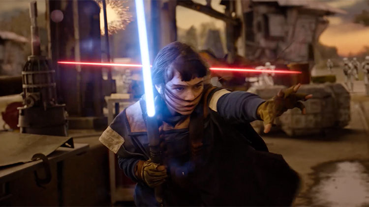 a girl fighting off enemies with a light saber