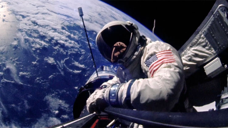 an astronaut floating in space with the earth in the background